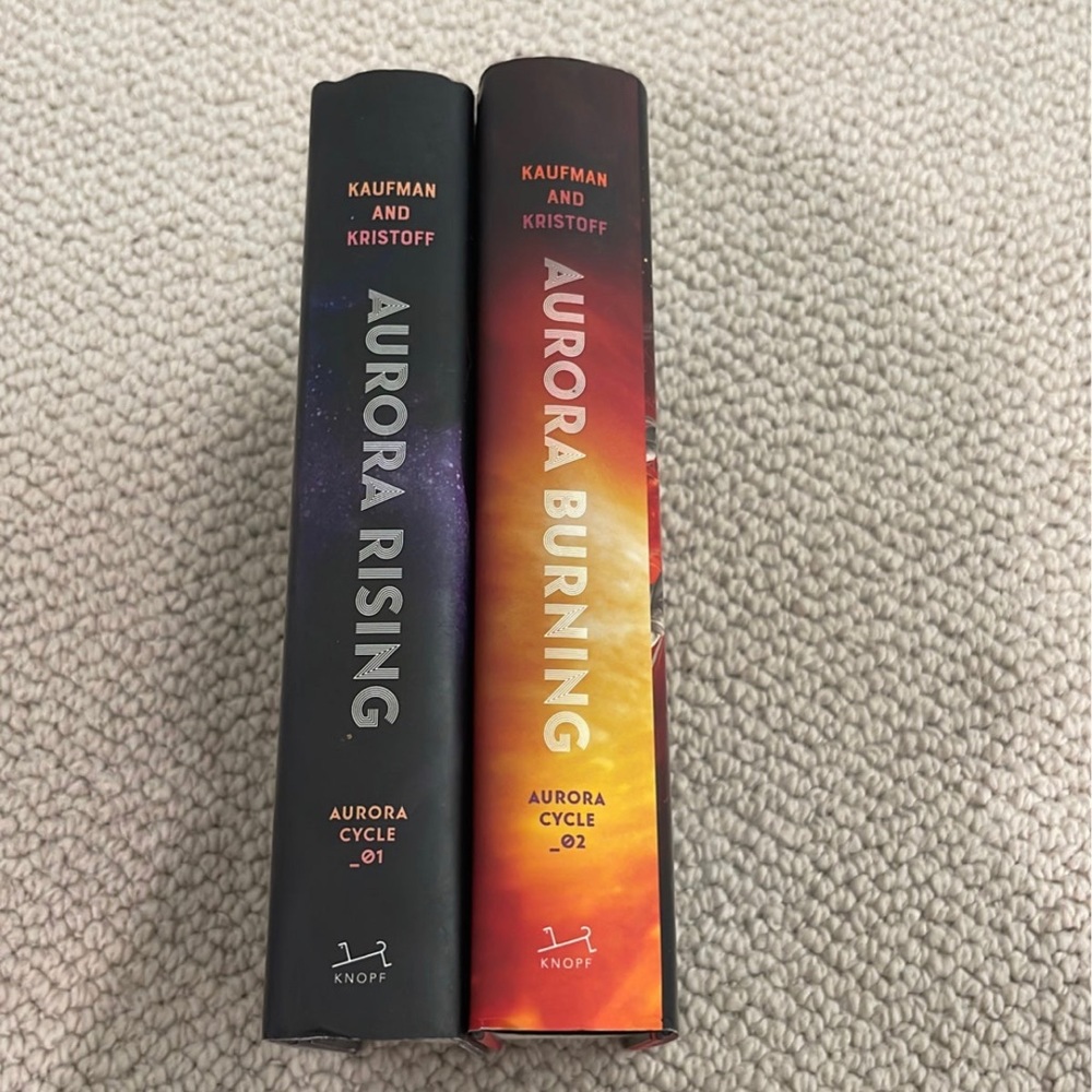 Aurora Rising and Aurora Burning by Jay Kristoff and Amy Kaufman